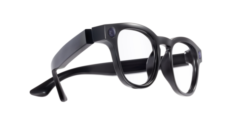 A close-up of a pair of smart glasses showing the frame and camera.